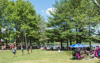 Fourth of July festivities include volleyball and picnicking at Lincoln Woods State Park
