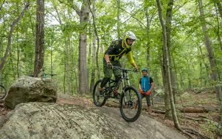 Mountain biker at Lincoln Woods State Park