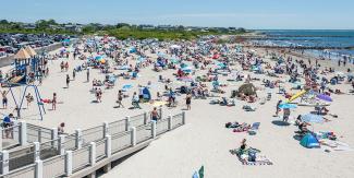 Aerial shot of beachgoers at Roger Wheeler State Beach on a warm summer day