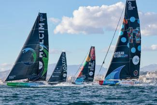 Racing boats in the water. Photo credit: Sailing Energy / The Ocean Race