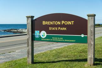 Park sign for Brenton Point State Park in Newport